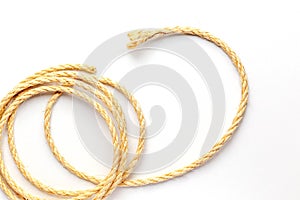 Coiled rope on a white background close up