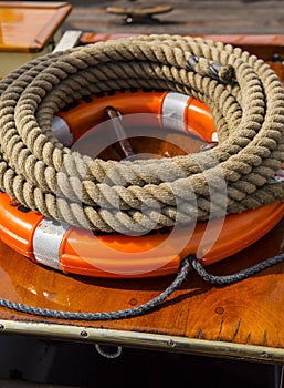 Coiled Ropes and life preserver on a rigged Ship