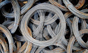 Coils of old galvanized wires with traces of rust