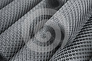 Coils of steel wire. Rabitz mesh netting rolls in warehouse