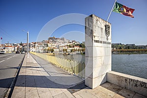 Coimbra cityscape with Santa Clara Bridge over Mondego river,  Portugal