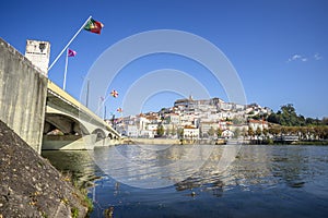 Coimbra cityscape with Santa Clara Bridge over Mondego river,  Portugal