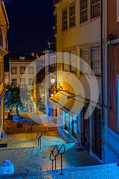 COIMBRA, PORTUGAL, MAY 20, 2019: Night view of a narrow street at the old town of Coimbra, Portugal