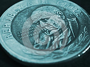 Coin of 500 Chilean pesos ÃÂlose up. Peso of Chile. News about economy or banks. Loan and credit. Money and taxes. Turquoise photo