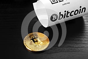 Coin crypto currency bitcoin lies on the keyboard background