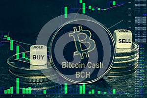 Coin cryptocurrency BCH Bitcoincash  stack of coins and dice. Exchange chart to buy, sell, hold.