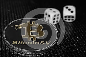 Coin cryptocurrency Bitcoin SV and rolling dice. BSV