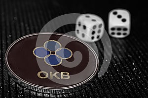 Coin cryptocurrency okex okb and rolling dice.