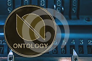 Coin cryptocurrency Ontology ONT against the numbers of the arithmometer.