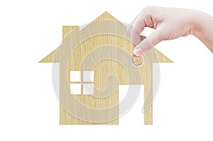 Coin Hand holding house icon in nature as symbol of mortgage,Dream house on nature background