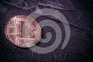 Coin Litcoin LTC on a concrete background with copy space