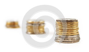 Coin money in stacks isolated
