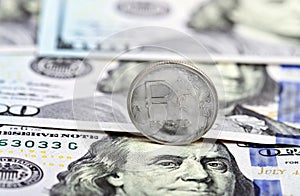 Coin one ruble against dollars