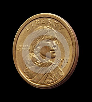 Coin one US dollar Sacagawea Dollar on a black background photo