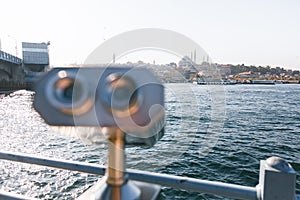 Coin Operated Binocular viewer next to the waterside promenade in Istanbul, Turkey looking out to Bosphorus Strait and city.