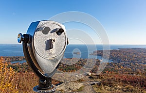 Coin operated binoculars above Camden Maine in the late fall.