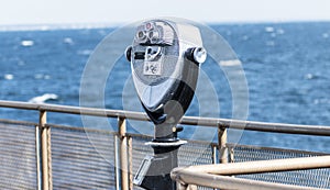 Coin operated binoculars on a boat