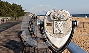 Coin operated binoculars looking west on Sunken Meadow State Parks boardwalk