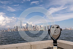 Coin operated binoculars with Manhattan skyline in the background