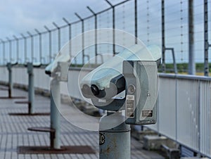 Coin-operated binoculars or telescope