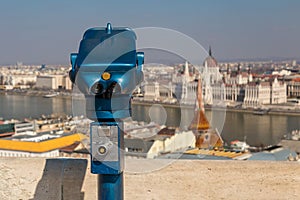 Coin operated public binoculars at Budapest. Blue telescope on observation deck