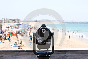 Coin-Operated Scope Overlooking a Beach