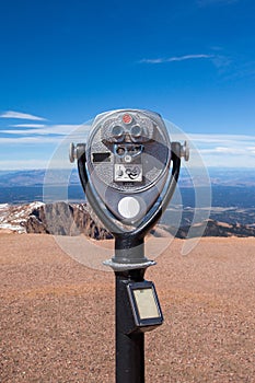 Coin operated telescope on the top of Pike peak summit, Colorado