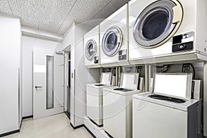 Coin-operated washing machine in the laundry