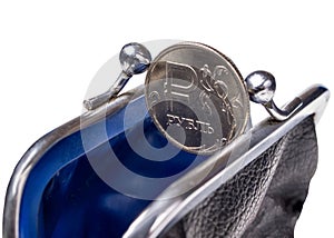 Coin ruble in open purse isolated on a white background