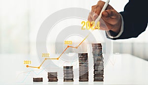 Coin stack with digital graphic indicator symbolize business investment. Shrewd