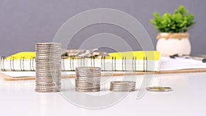 coin stack growth up on gray background. money saving, financial grow, business, economy budget and investment concept