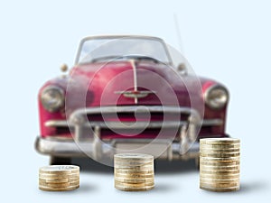 Coin stacks in front of oldtimer car