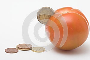 Coin in tomato