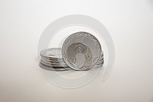 Coin worth five Ukrainian kopecks. coin on a white background is standing upright