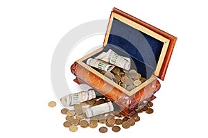 Coins and banknotes in the box