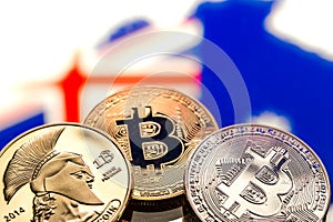 coins Bitcoin, against the background of Australia and the Australian flag, concept of virtual money, close-up. Conceptual image.