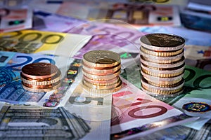 Coins chart on euro banknotes stock exchange, money in rise