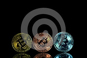Coins of cryptocurrency or Bitcoin lying over laptop keyboard,