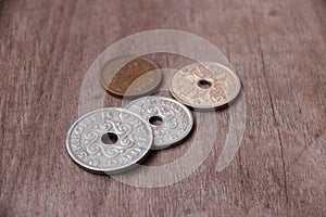 Coins of Denmark on the wooden floor, Danish krone money, the co