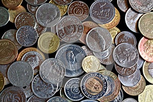 Coins of different countries and continents, close-up. Background image