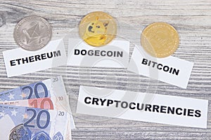 Coins, euro bills and inscription cryptocurrencies. International network payment. Finance concept