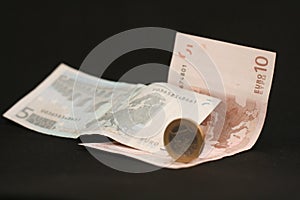 A Coins and euro notes currency banknotes