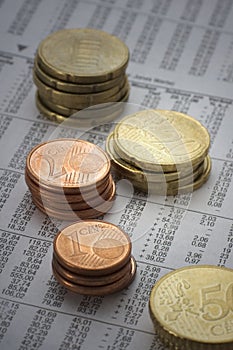 Coins on financial figures