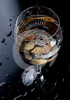 Coins in a glass photo