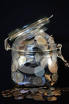 Coins in a glass jar
