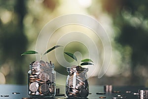 coins in glass jar, finance and banking, fund growth and savings concept, financial efficiency planning, retirement savings,