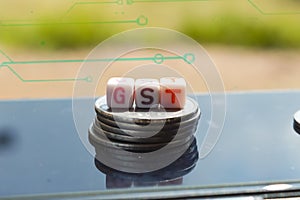 coins and gst text ,coins