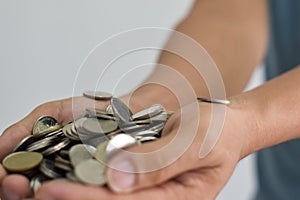 Coins in hands. Concept money saving