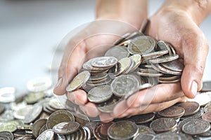 Coins in hands. Finance and investment. saving money concept