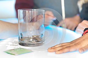 Coins inside the glass